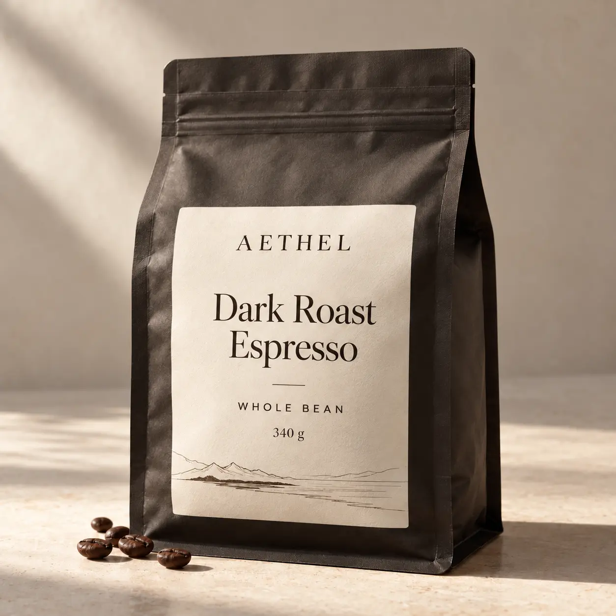 AETHEL Dark Roast Espresso coffee beans in a charcoal pouch with an ivory label